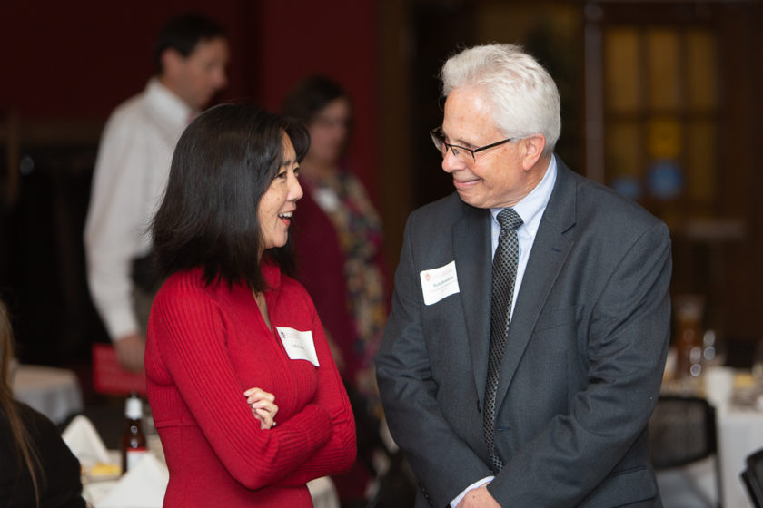 Staff talking at Citations of merit dinner