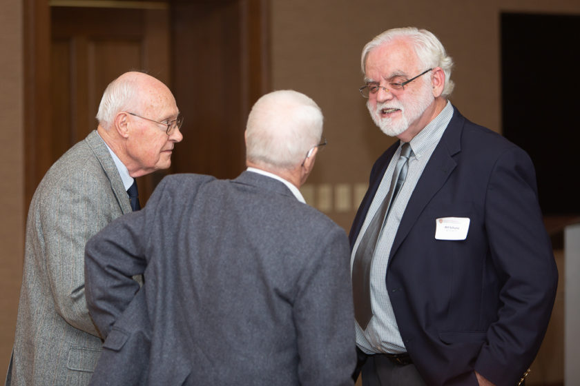 Staff talking at Citations of merit dinner