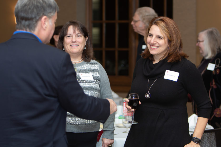 Staff talking at Citations of merit dinner