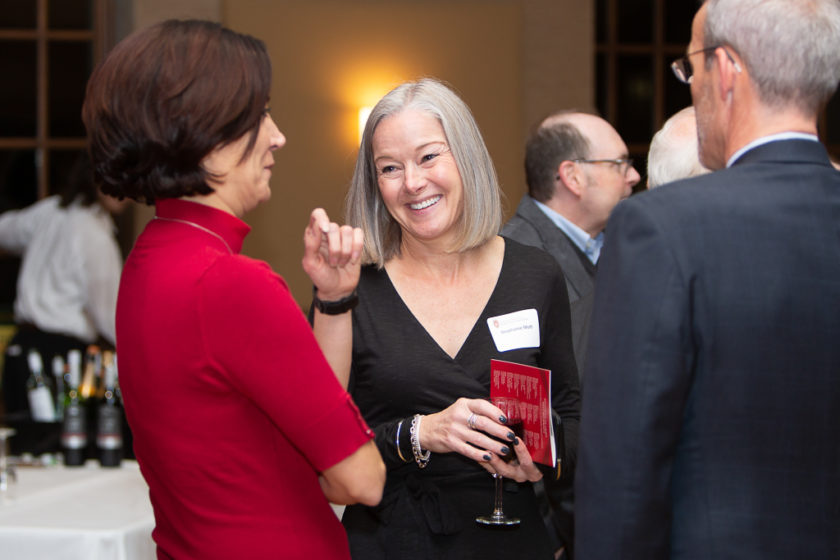 Staff talking at Citations of merit dinner