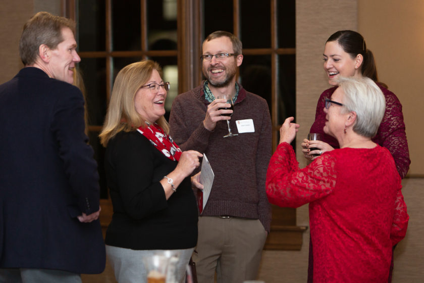 Staff talking at Citations of merit dinner