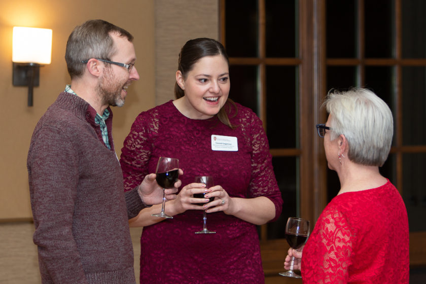 Staff talking at Citations of merit dinner