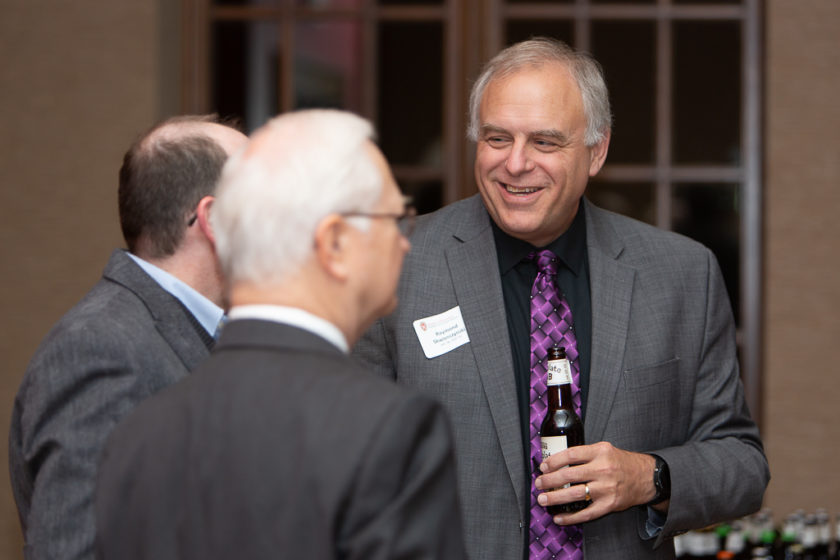 Staff talking at Citations of merit dinner