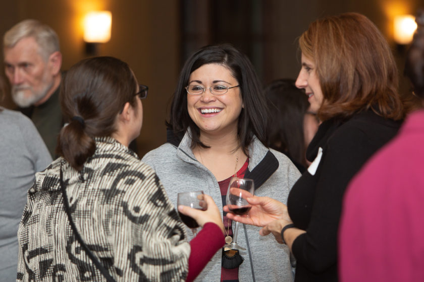 Staff talking at Citations of merit dinner