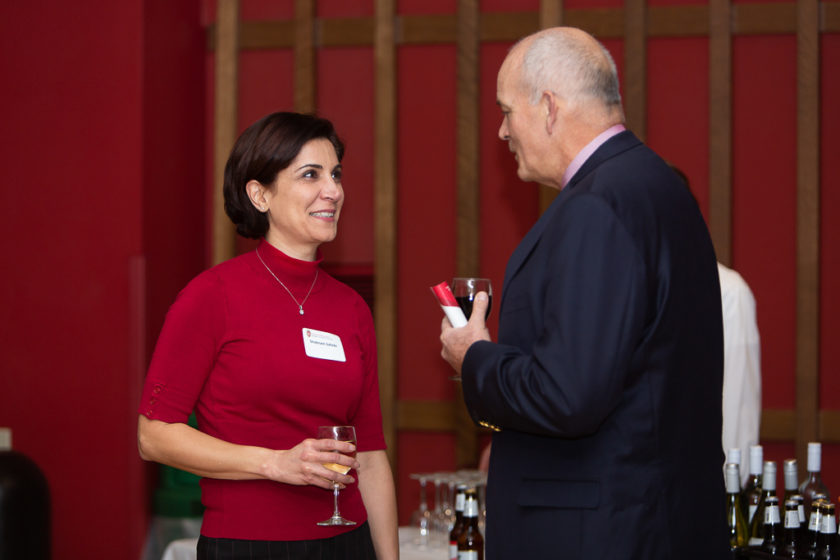 Staff talking together at Citations of Merit dinner