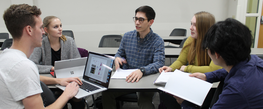 Pharmacology and Toxicology program students discuss a class project.