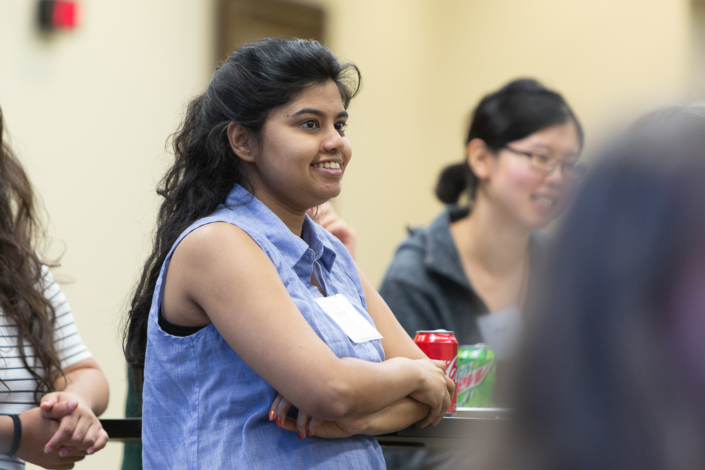 Deepika Rao, scholarship recipient, listening to speaker at event
